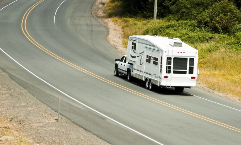 Fifth wheel RV traveling on the highway